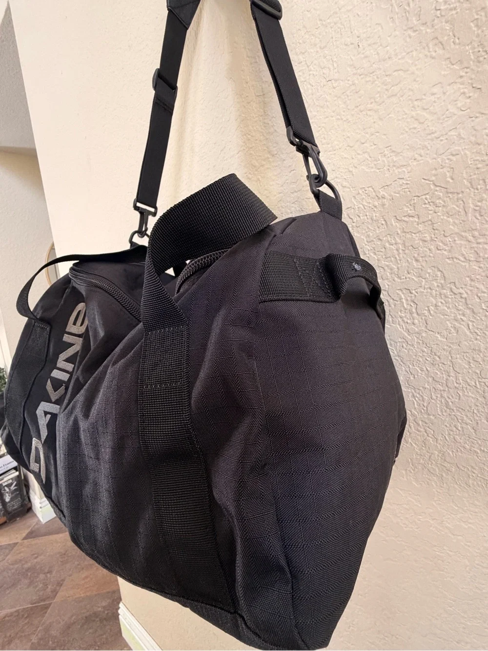 DAKINE Black Men’s Duffel with White Logo